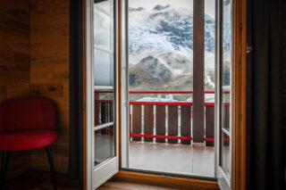 Hotelzimmer mit Balkon, Hotel Posthuis Melchsee Frutt Schweiz